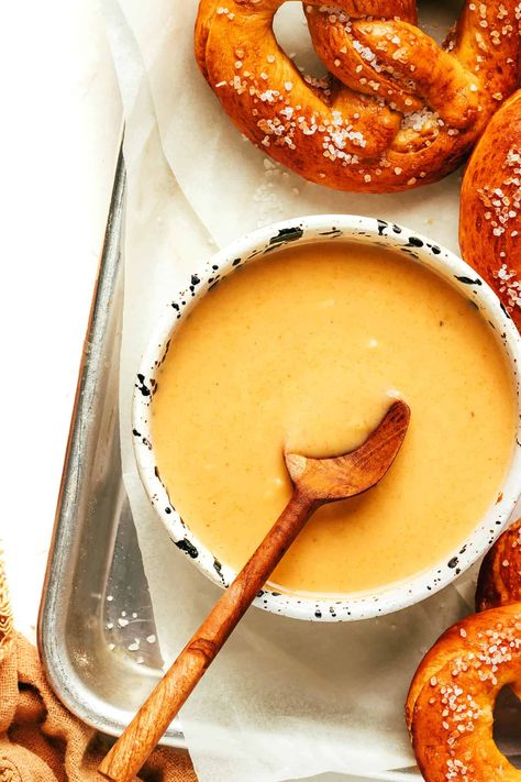 This 15-Minute Beer Cheese Dip recipe is easy to make, and full of the best zesty, creamy flavors! Serve it with pretzels, chips, dips, veggie sticks or whatever else sounds good. | gimmesomeoven.com #cheese #dip #queso #appetizer #gameday #snack #vegetarian #easy #entertaining Pretzel Cheese Dip Recipes, Cheese Dip Queso, Beer Cheese Dip For Pretzels, Pretzel Cheese Dip, Gameday Snacks, Beer Cheese Dip Recipe, Veggie Sticks, Cheese Dip Recipe, Pretzel Cheese