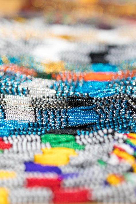 African glass bead background. Glass bead necklaces for sale in an African market. These traditional tribal beads are sold all over Africa as souvenirs royalty free stock photography Bead Background, Beads Background, Glass Bead Necklaces, African Market, Bead Necklaces, African Beads, Stock Photography Free, Handmade Beads, Glass Bead Necklace