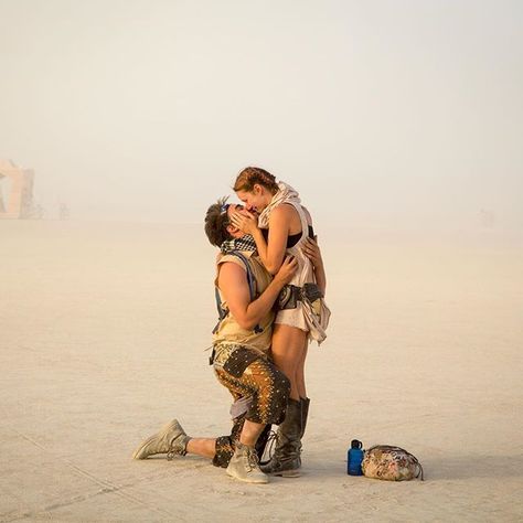 Photo by @blessedwithabeard | "To me, Burning Man feels like the conduit between what could be and what is," @young.wanderess explains. "In that swirl, we fell deeper into love. There wasn't a more fitting place for him to propose." | #burningman #blackrockcity #brc Burning Man Couple, The Conduit, Festival Outfit Inspiration, Vision Of Love, Fantasy Fest, Black Rock City, Man Projects, Burning Man Outfits, Burning Man Festival