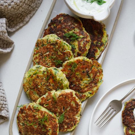 Easy Greek Kolokithokeftedes (Zucchini Fritters) Best Tzatziki Recipe, Tomato Fritters, Easy Zucchini Fritters, Greek Zucchini, Zucchini Shredded, Greek Recipes Easy, Zucchini Meatballs, Recipes Greek, Recipes Zucchini