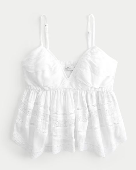 Women's Easy Lace Babydoll Top | Women's Tops | HollisterCo.com Outer Banks Fits, Cropped Tank Top Outfit, White Babydoll Top, Semester At Sea, Summer Shopping List, Tank Top Outfit, White Flowy Top, White Babydoll, Everything All At Once