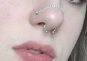 Double nose chain piercing Over The Nose Chain With Septum, Nose Peircings Double Chain, Over Nose Piercing Chain, Connected Nose Piercing Chain, Double Nose Piercing Chain Across, Nostril Piercing With Chain, Chain Over Nose Piercing, Heart Nose Chain, Alt Nose Piercing