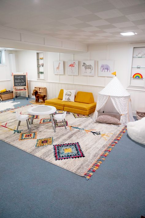 Basement Playroom Makeover On A Budget - The New York Stylist Low Ceiling Playroom, Finished Basement Playroom, Unfinished Basement Playroom, Boho Basement, Basement Play Area, Kids Playroom Basement, Kids Playroom Ideas Basement, Family Room Playroom, Cheap Vinyl Flooring