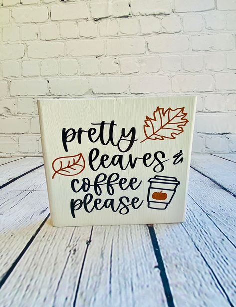 "Pretty leaves , coffee please.  Fall such a wonderful time of the year.  Curling up with a warm blanket and a warm cup of coffee is just perfect. And decorating your Coffee station for the season is easy with the adorable sign This fall coffee wood sign is a perfect addition to any tiered tray, display on a coffe table, mantel, coffee bar, etc. The sign measures 5.5\"x5.5\" This sign has been painted with white chalk paint. Letters are permanent vinyl. Please note, this item is handmade and han Fall Kitchen Signs, Fall Coffee Bar Signs, Fall Cafe Decor, Thanksgiving Coffee Quotes, Fall Coffee Quotes, Coffee Bar Sign Ideas, Fall Coffee Station, Fall Coffee Bar Ideas, Fall Coffee Bar