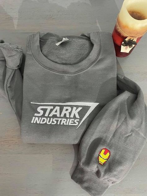 Stark Industries Embroidered Sweatshirt Stark Industries Embroidered Sweatshirt is best Embroidery Clothing for you or gift for friend, family. Shopping more hoodie at here , . Are you looking for a stylish and comfortable way to show off your love of Stark Industries? Look no further than the Stark Industries Embroidered Sweatshirt from DreamArtCanada. This high-quality sweatshirt is made from soft, breathable cotton fabric and features an intricate embroidery design that will make you stan... Stark Industries, Marvel Clothes, Design Sweatshirt, Oversized Crewneck, Men Sweatshirt, Embroidered Crewneck, Shirt Embroidery, Embroidered Clothes, Embroidered Sweatshirt