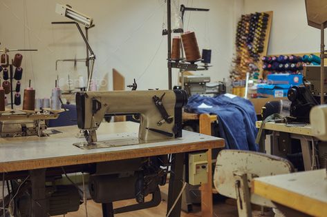 Image of a tailor's workplace with a sewing machine at a sewing workshop. by fxquadro. Image of a tailor¡¯s workplace with a sewing machine at the sewing workshop. #Sponsored #workplace, #Image, #tailor, #workshop Background For Tailoring, Tailoring Workshop Design, Tailors Workshop, Tailoring Background, Tailoring Machine Images, Vintage Tailor Shop, Tailor Workshop, Machine Image, Preschool Activities Toddler