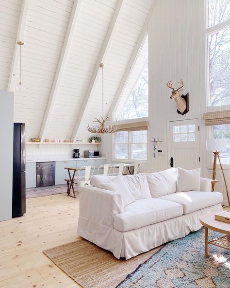 All-White A-Frame Cabin Tour Photos | Apartment Therapy A-frame Interior, Kids Nook, White Cabin, Cabin Renovation, A Frame Cabins, A Frame House Plans, Cabin Interiors, A Frame Cabin, A Frame House