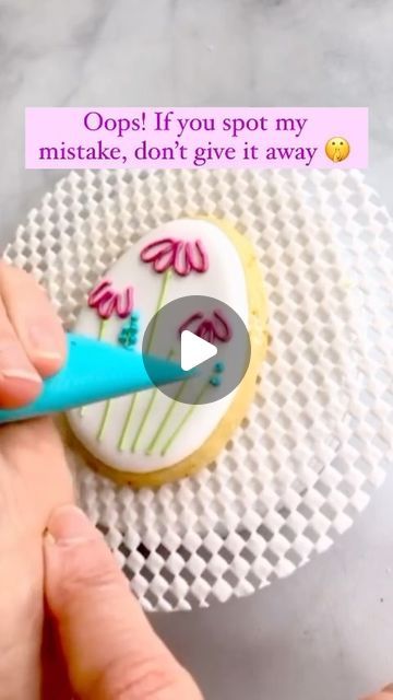 Mary Mansfield on Instagram: "I bring this little egg cookie back every year to ask… what did I miss?? If you spot it, let me know without giving it away, please! 😉  #cookievideo #canyouspotit #cookiedecoratingvideo #royalicing #eastercookies #eastereggcookies  #royalicingcookies #decoratedcookies #icingcookies #decoratedsugarcookies  #cookiedecorating #cookiesofinstagram" Royal Icing Cookie Videos, Cookie Decorating Designs, Easy Spring Cookies Decorated, Royal Icing Techniques Cookie Decorating, Cookie Videos Decorating, Royal Icing Flower Cookies Tutorial, Royal Icing Flowers On Cookies, Egg Cookie Decorating, Spring Sugar Cookies Decorated