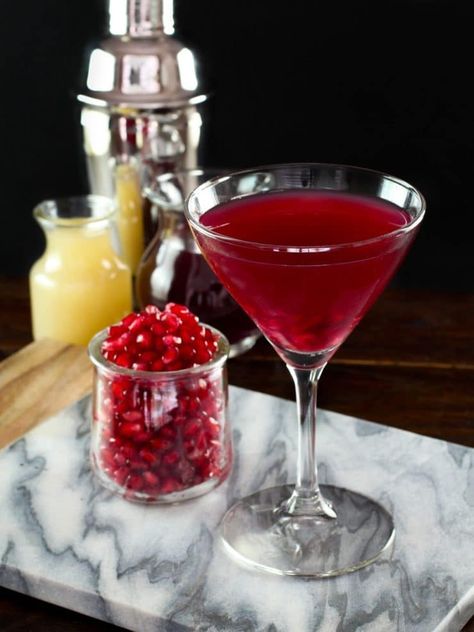 Pomegranate Martini - delicious and aromatic cocktail with citrus vodka, orange liqueur, lime juice and orange blossom water. Includes mocktail variation. #pomegranate #martini #cocktail #lime #mocktail #roshhashanah #purim #TorisKitchen Pomegranate Martini Recipe, Vodka Orange, Pomegranate Liqueur, Pomegranate Martini, Citrus Vodka, Orange Vodka, Drinks Ideas, Orange Liqueur, Martini Recipe