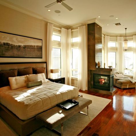 Check out this contemporary master bedroom with cherry wood floors and a cozy reading nook on HGTV.com. Neutral Bed, Neutral Bed Linen, Cherry Wood Floors, Stone Fireplace Surround, Small Fireplace, Brown Floors, Bedroom Images, Brown Bedroom, Fireplace Surround