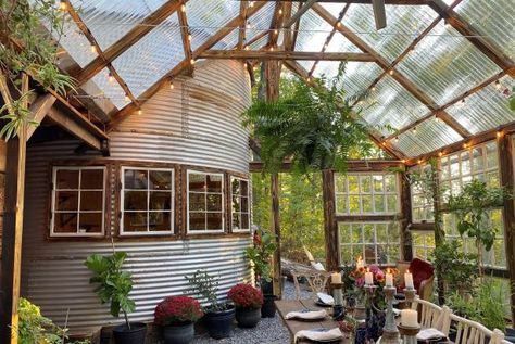 The abundance of plants, along with the Blue Ridge Mountain views, makes this greenhouse feel tranquil. The string lights hanging above and the candles on the table bring a cozy-vibe to the nature-filled room, as seen on DIY Network's Building Off the Grid. Off Grid House, Cabin In The Mountains, Georgia Mountains, Dome House, Diy Network, Up House, Modern Cabin, Off Grid Living, Off Grid