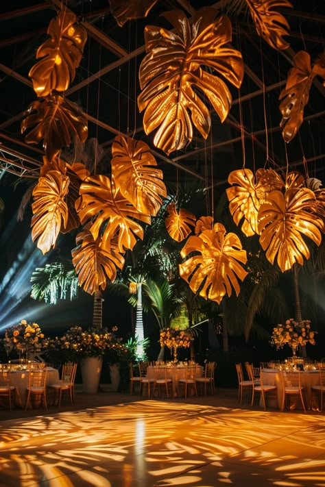 Tropical Summer Wedding Decor: Gilded Leaves, Candlelight, and Modern Elegance – A Sparkly Life for Me Tropical Dance Floor, Candle Wall Wedding, Cocktail Style Reception, Dance Floor Decor, Party Ceiling Decorations, Wedding Installations, Tropical Dance, Summer Wedding Decor, Installation Ideas