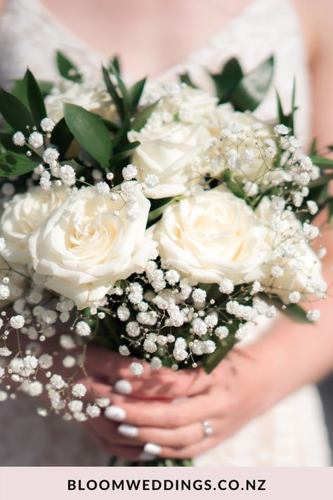 This simple but classic white wedding bouquet is filled with classical baby breaths, white roses, emerald italian ruscus greenery, textures, and a beautiful white tone colour palette perfect for a summer wedding. Italian Ruscus Greenery, Ruscus Greenery, Botanical Wedding Theme, Bride Bouquets White, White Peonies Bouquet, Classic White Wedding, Wedding Flowers Greenery, Small Wedding Bouquets, Simple Wedding Bouquets