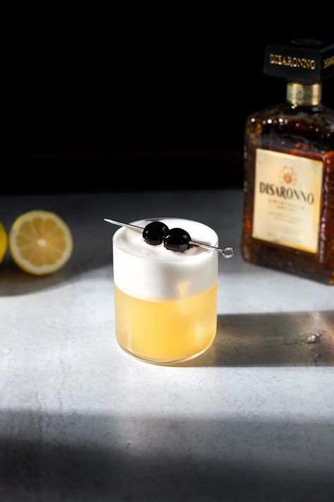 Amaretto Sour - Moody Mixologist Amaretto Sour Aesthetic, Amaretto Aesthetic, Mixologist Aesthetic, Ameretto Sour, Moody Mixologist, Cocktail Amaretto, Amaretto Sour Recipe, Amaretto Sour Cocktail, Amaretto Sour