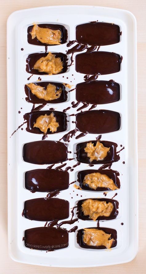 SO cute & easy - Irresistible chocolate peanut butter candy cups, made with an ice cube tray for whenever a craving hits ... http://chocolatecoveredkatie.com/2016/02/29/ice-cube-tray-chocolate-peanut-butter-cups-recipe/ @choccoveredkt Ice Tray Recipes, Ice Cube Tray Chocolates, Ice Cube Tray Recipes, Butter Candy, Candy Cups, Chocolate Covered Katie, Pb Cups, Peanut Butter Candy, Ice Trays