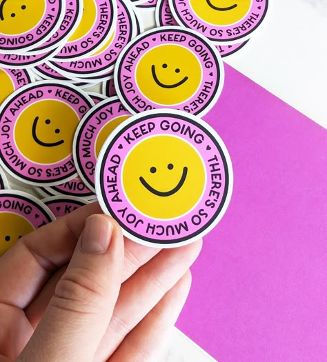 These "there's so much joy ahead" cute Happy Smiling Face Stickers make awesome gifts & sweet reminders for yourself :) Stick them to your water bottle, laptop, tablet, notebook, phone, journal, mirror, car, or anywhere you'd like! Our stickers are made from a durable vinyl laminate that resists scratching, water, and sunlight. You can even put them in the dishwasher! 😊 ⋒ Created & shipped from our art studio on Kauaʻi, Hawaiʻi.🌈 Listing is for one sticker! Sticker Size (inches): 2" x 2" Stick Happy Stickers Cute, Smile Branding, Sticker Product Photos, Art Journal Stickers, Wellness Stickers, Happiness Stickers, Craft Pricing Formula, Emotion Stickers, Happy Branding