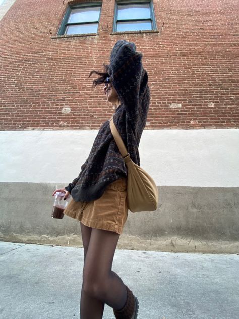 Fit inspo, ootd, fit pic, grandpa sweater, fuzzy sweater, brown sweater, uniqlo crescent bag, uniqlo side bag, uniqlo crescent tan bag, corduroy mini skirt, mini skirt, corduroy skirt, black tights, docs, brown leg warmers, sunglasses, iced latte, aesthetic, cute, vintage, thrift Brown Cord Skirt, Beige Corduroy Skirt Outfit, Uniqlo Corduroy Bag, How To Style Corduroy Skirt, Brown Cord Skirt Outfit, Cord Skirt Outfit Winter, Brown Mini Skirt Outfit Winter, Brown Courdory Skirt Outfit, Uniqlo Crescent Bag