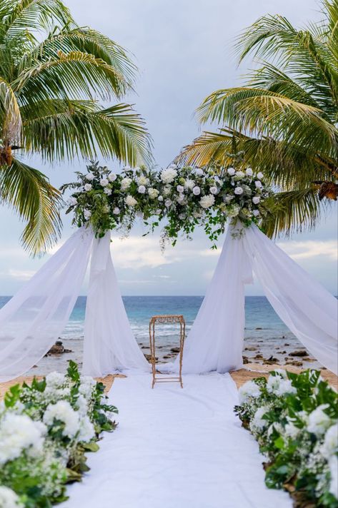 Wedding arch at the beach #wedding #destinationwedding #weddingtip #bridetip #cruisewedding #beachwedding #eventplanner #weddingplanner #weddingdress #marryinroatan #roatan #honduras #beach #destinationweddingtips #weddingdetail #weddingday #weddingvenue #weddingceremony #beachweddingideas #bridalflowers #sunsetwedding #weddingdress #weddingdecor #weddingideas #weddingphotography #modernwedding #luxurywedding Wedding Arch Ideas Beach, Beach Wedding Photobooth, Beach Wedding Arch Ideas, Wedding Environment, Green Beach Wedding, Honduras Beach, Beach Wedding Ceremony Arch, Beach Wedding Setup, Wedding Alter