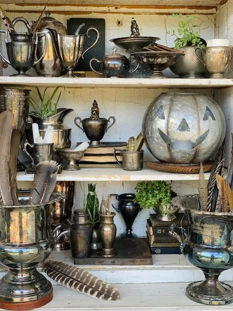 Tarnished Silver Decor, Fall Antique Booth Ideas, Halloween China Cabinet, Halloween Antique Booth Ideas, Witchy Curio Cabinet, Dark Academia China Cabinet, Bookshelves Styling, Victorian Curiosity Cabinet, Gothic Display Cabinet