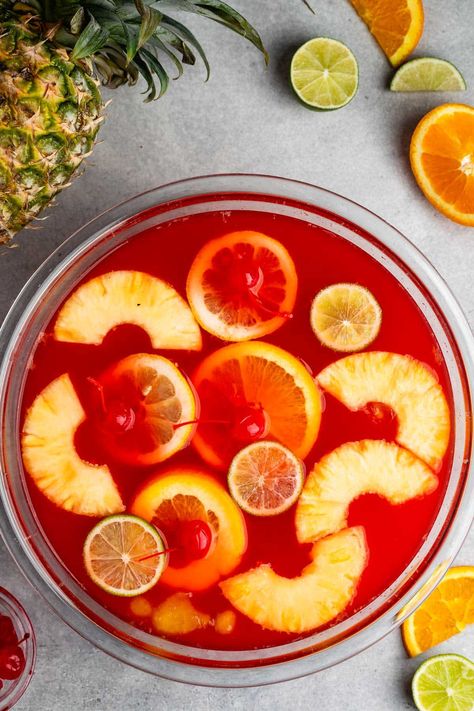 This Easy Party Punch is perfect for a crowd and feeds a ton of people - plus it's non-alcoholic and so delicious Homemade Fruit Punch Recipes, Party Punch Recipes Nonalcoholic, Non Alcoholic Punch Recipes For A Crowd, Ginger Ale Mixed Drinks, Simple Punch Recipe, Summer Party Punch, Punch Recipes Non Alcoholic, Punch For A Crowd, Strawberry Punch Recipes