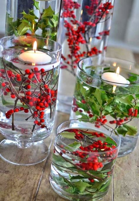 easy holly centerpiece in a glass vase with floating candles Christmas Crafts Diy Decoration, Diy Floating Candles, Christmas Crafts Diy Projects, Driven By Decor, Rustic Wedding Decorations, Christmas Tree Decorations Diy, Christmas Crafts To Make, Christmas Favorites, Holiday Centerpieces