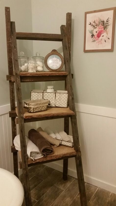 Farmhouse-Ladder shelf: Made out of 100 year old wood, used for bathroom toiletries and storage. Very rustic Ladder Shelf Wooden, Over The Toilet Storage Ideas Farmhouse, Ladder Shelf In Bathroom, Vintage Ladder Shelf, Ladder Decor Bathroom, Ladder Shelf Decor Bathroom, Old Ladder Shelf, Room Shelves Decor, Living Room Shelves Decor