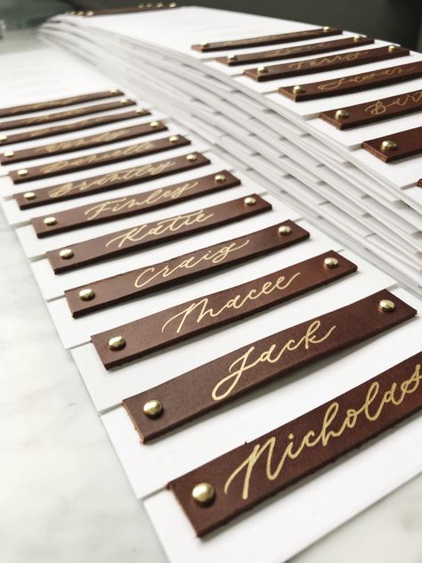 Menus with personalized leather tags Leather Seating Chart Wedding, Leather Name Tags Wedding, Leather Name Tag, Leather Wedding Decor, Leather Wedding Invitations, Western Shoot, Upscale Wedding, Leather Menu, Leather Tags