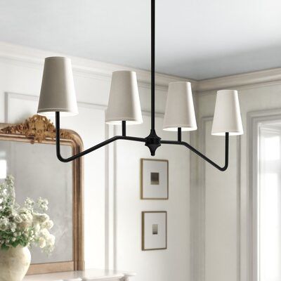 This Diana 4 light kitchen island linear pendant light streamlines the classic chandelier look for a modern update to your French country space. It's made of metal with two sloping arms that feature two lights each, evenly spread across its 40'' width. Each candle-style light features a fresh white fabric shade with a bell shape that softens the look. We love that this pendant light is height adjustable as well as sloped ceiling compatible up to 15 degrees in any direction. Additional angling ca Kitchen Lights, Kelly Clarkson Home, Classic Chandelier, Linear Pendant Light, Kitchen Island Linear Pendant, Light Kitchen Island, Kitchen Island Lighting Pendant, Light Kitchen, Geometric Chandelier