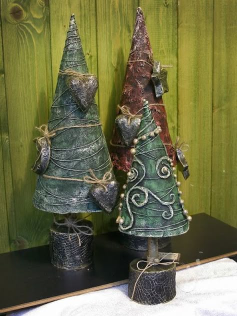 If you feel like you have so many papers lying around the house, then why not take the opportunity to make some paper mache crafts? This art is a popular school project, but it does not mean it stays there. Paper mache art can definitely liven a room. Plus you get recycle and help the … Paper Mache Tree, Paper Mache Cone, Diy Paper Mache, Paper Mache Christmas, Paper Mache Ideas, Paper Mache Projects, Paper Mache Clay, Cone Trees, Mache Art