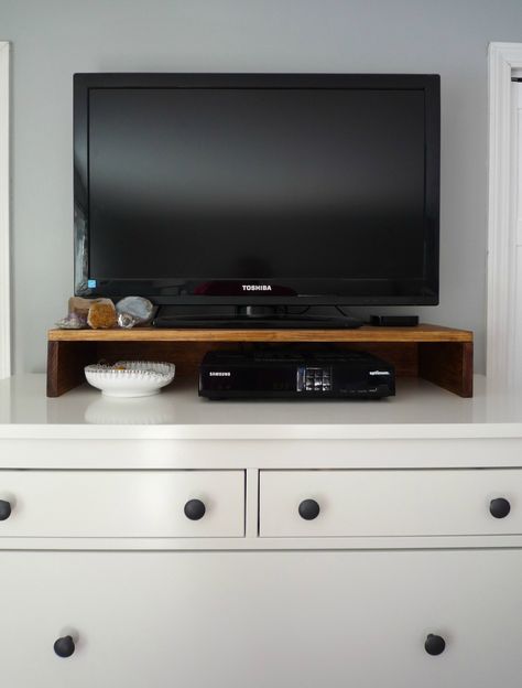 Make a TV stand for the top of your dresser or console to hold cable boxes. Tv Riser On Dresser, Small Tv Stand For Kids Room, Hemnes Dresser Tv Stand, Tv On Top Of Dresser Bedrooms, Small Tv On Dresser In Bedroom, Bedroom Tv Stand Ideas Dressers, Diy Tv Riser Stand, Diy Tv Riser, Tv On Top Of Dresser