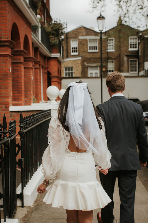 The bride in an open back short wedding dress with short wedding veil with white satin bow detail | bridal fashion | bridal accessories | wedding veil | wedding fashion | Peach Portman Photography Short Wedding Veils, Wedding Veil Ideas, Short Wedding Veil, Veil Ideas, Timeless Bride, Wedding Veils Short, Short Veil, Veil Wedding, Wedding Cape