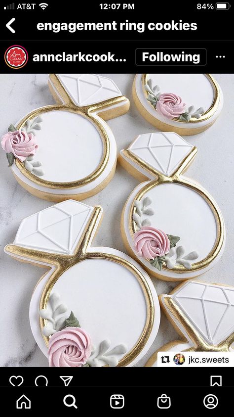 Sutton cookies ￼ Victoria Jones | Decorated Sugar Cookies | Keller, TX on Instagram: "Simple elegance is how I would describe this weeding dress decorated sugar cookie. The photo doesn’t do it justice!  Go check out my stories to see how I added a gorgeous Pearl sheen to these cookies ❤️ • • Cutter @annclarkcookiecutters princess dress cutter trimmed n the sides.  Super Pearl dry dust @thesugarart  Nonpareils @wiltoncakes" Claire Sharp | Custom Baked Goods | Huntsville, AL on Instagram: "Soft sugar cookie shortbread with royal icing for this beautiful wedding dress cookie 😍 #custommade #cookies #customcookies #royalicing #homebaker #wedding #huntsvillealabama" Bouge Cookie Company on Instagram: "Wedding season is upon us! 💍👰🏼‍♀️ Can’t wait to show you this whole set! My new favorite (I Decorated Wedding Dress Cookies, Elegant Royal Icing Cookies, Pearl Cookies Decorated, Ring Cookies Decorated, Wedding Ring Cookies Decorated, Wedding Dress Cookies, Wedding Cookies Decorated, Wedding Shower Cookies, Cookie Company