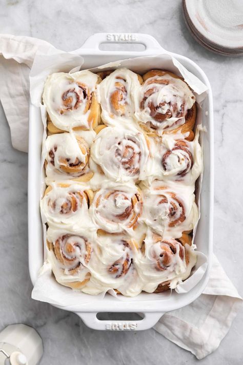 There is nothing better than pillowy soft, gooey-in-the-middle, smothered in cream cheese frosting, homemade cinnamon roll. These perfect cinnamon rolls taste even BETTER than Cinnabon. Cinnamon Roll Casserole Homemade, Broma Bakery Cinnamon Rolls, Pillowy Soft Cinnamon Rolls, Fluffy Cinnamon Rolls Homemade Recipe, Homage Cinnamon Rolls, Perfect Cinnamon Rolls, Gooey Cinnamon Rolls Homemade, Cinnamon Roll Wedding Cake, Cinnamon Rolls No Egg