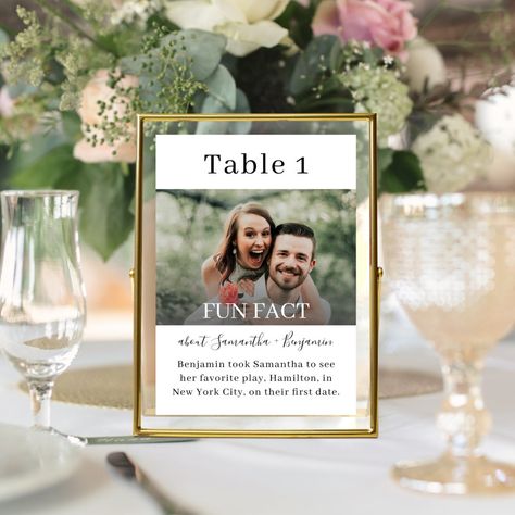 These creative, Fun Facts about the bride and groom wedding table numbers will entertain your reception guest with fun and interesting information about your love story and personalities. The black-and-white design features one of your photos and is embellished with hand-lettered calligraphy script and a stylish serif font. If you need assistance customizing this product or would like me to create additional, matching items, please contact me at admin@albamarie.com. I'd be happy to help! Note: T Personal Centerpieces Wedding, Table Numbers Wedding With Photos, Pictures For Table Numbers, Pictures As Centerpieces Weddings, Wedding Centerpieces Photos, Cute Wedding Table Ideas, Wedding Guest Seating Chart Ideas, Table Number Wedding Ideas, Wedding Numbers Table Ideas