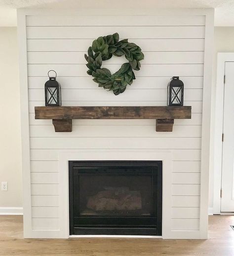 My husband and I recently fixed up a house. We wanted to added something fun to the living room to make it more attractive. So, we decided to shiplap the fireplace and add a wood mantel. I am so glad we did it. I think it helped resell the house, that’s what we got the most compliments on after we finished everything. The shiplap was from Lowe’s and the wood mantel was from amazon. I picked an unfinished mantel so I could choose the stain in person. I began by staining the bottom of t… Magnolia Homes Living Room, Diy Shiplap Fireplace, Living Room Mantle, Faux Fireplace Diy, Brick Fireplace Makeover, Minimalist Living Room Decor, Shiplap Fireplace, The Mantle, Diy Shiplap