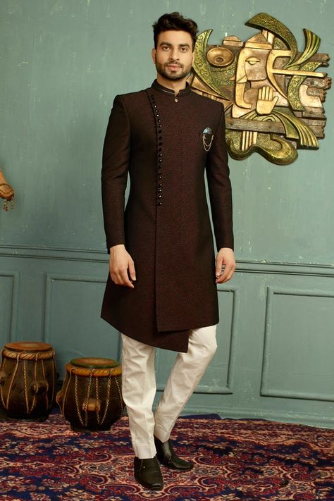 Make a niche style statement this Wine,Black Color Jacquard,Imported Fabric Mens Indo Western. All patterns are intricately embellished with Embroidered Work work.Cost Includes Indowestern and pants with it Mens Indian Wear, Sherwani For Men Wedding, Wedding Kurta For Men, Mens Wear Wedding, Groom Dress Men, Indian Groom Wear, Wedding Dresses Men Indian, Sherwani Groom, Mens Sherwani