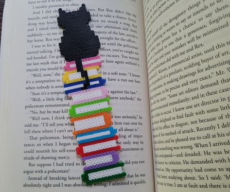 A super cute cat bookmark to add style to your reading! Made with mini perler beads The bookmark is made from soft and flexible beads that were melted together Bookmark Size: Approximately  15 cm by 3cm (Approximately 6 inches by 1.25 inches) All of my items are handmade. Each one is unique and might not be exactly the same as shown on photos. Please keep away from heat for long periods of time. Have a specific bookmark you want? Feel free to send me a message!  If you have ANY questions or concerns please contact me! Perler Beads Bookmark, Cat Perler Beads, Beads Bookmark, Mini Perler Beads, School Bookmarks, Perler Beads Ideas, Cat Bookmark, Hamma Beads Ideas, Easy Perler Beads Ideas