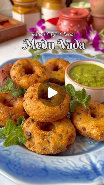 Foodklick on Instagram: "✨ Instant Medu Vada ✨

If you have not soaked the lentils for making the actual, real Medu vada, but your cravings for a deep fried snack is irresistible, then instant medu vada is the solution. With bare minimum ingredients and time, you can whip up a real crisp medu vada. It’s scrumptious, crisp outside and soft inside just like the REAL one.

Ingredients:
• 1 cup cooked Rice
• 1/2 cup Sooji
• 1/2 cup Yogurt
• 1/2 tsp Crushed Black pepper
• 1/2 tsp Green chilly chopped 
• 1/2 tsp Jeera crushed
• Salt to taste
• 1 onion finely chopped 
• 1 tbsp Curry leaves
• 2 tbsp Coriander leaves
.
.
.
#instant #meduvada #recipe #reels #reelitfeelit #foodreels #reelsexplore #indianfood #tasty #desikhana #foodbloggers #tasteofindia #southindianfood #foodreelsinindia #desifood #t Mendu Wada, Medu Vada Recipe, Medu Vada, Instant Rice, Cooked Rice, Bare Minimum, Desi Food, South Indian Food, Yogurt Cups