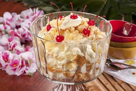 Pina Colada Trifle | MrFood.com Desserts Pineapple, Filipino Fruit Salad, Best Potluck Dishes, Fruit Salad Ingredients, Trifle Desserts, Homemade Frosting, Trifle Recipe, Instant Pudding Mix, Fruit Salad Recipes