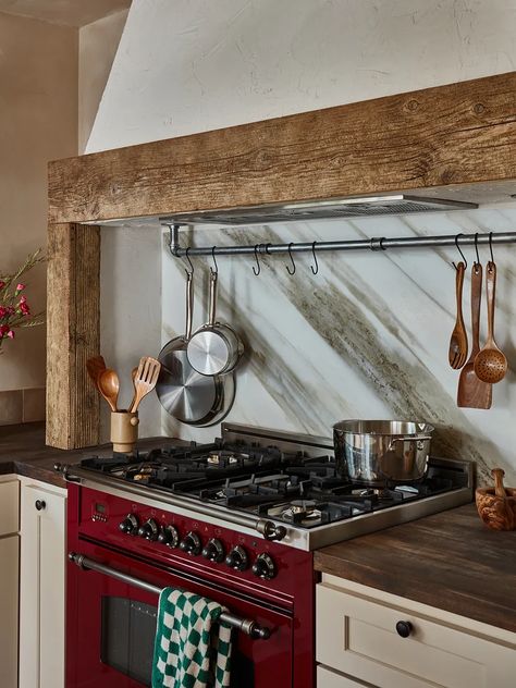 Red range in kitchen with wood hood accents Tuscan Cottage, Cobblestone Patio, Tuscan Kitchen, Tuscan Inspired, Marble Backsplash, Old Cottage, Bunk House, Tuscan Style, Flipping Houses