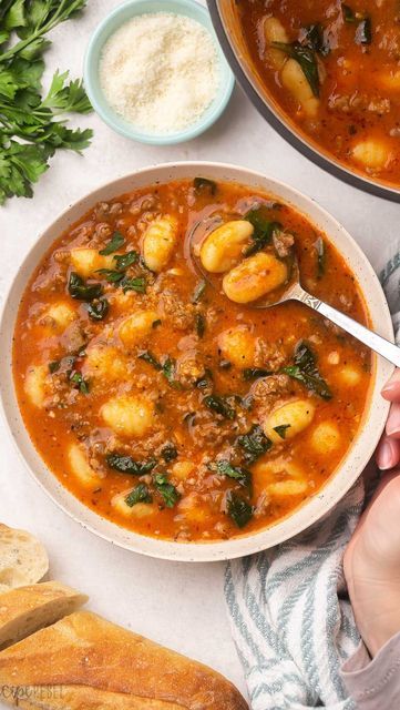 Ashley | Easy Family Meals on Instagram: "This Sausage Gnocchi Soup is going back on the menu this week (getting ready for the ❄️😏) — it’s hearty and flavourful and the BEST with garlic bread for dunking. Michele says “⭐️⭐️⭐️⭐️⭐️ So so good! Made it for lunch at our office and everyone loved it! Added a little heavy cream at the end…so creamy and yummy.” I love that idea! Get the recipe at the link in my profile @thereciperebel 👈👈 https://www.thereciperebel.com/italian-sausage-gnocchi-soup Tomato Basil Gnocchi Soup, Trader Joe’s Gnocchi Tomato Soup, Gnocchi Sausage Soup, Gnocchi Tomato Soup, Italian Gnocchi Soup, Italian Sausage Gnocchi Soup, Gnocchi Soup Recipes, Sausage And Gnocchi Soup, Italian Sausage Gnocchi