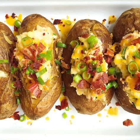 Loaded Baked Potatoes with Bacon and CheddarDelish Stuffed Spuds, Broke Meals, Dinner Ides, Bake Potato, Potatoes With Bacon, Cheddar Recipes, Cheap Recipes, Potato Bake, Cheesy Potato