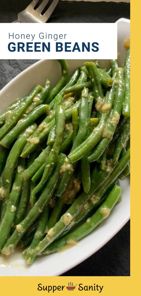 This delicious recipe for Honey Ginger Green Beans is great hot, room temperature, or cold. This healthy vegetabel is an easy and flexible side dish. The simple sweet Dijon mustard sauce makes these green beans scrumptious. It's made with readily available ingredients but has an exotic taste because of the ginger and cayenne pepper. Other ingredients include Dijon mustard, vinegar, and honey. Try it in your meal rotation. #familyfriendly #veggies #healthyrecipes Zucchini Broccoli, Dijon Mustard Sauce, Kale Cabbage, Ginger Green Beans, Vegetable Side Dish Recipes, Carrots And Green Beans, Sauteed Green Beans, Meal Rotation, Cooking Green Beans