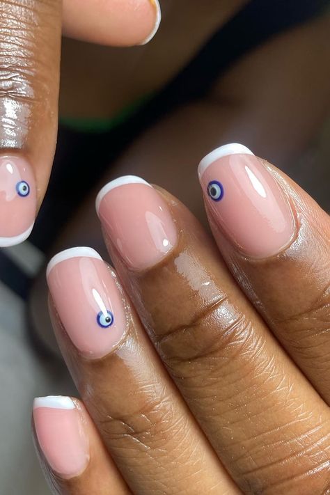 Natural Evil Eye Nails, Almond Nails French Tip Evil Eye, Greek Eye Nails Designs, French With Evil Eye Nails, French Manicure With Evil Eye, Turkish Eye Nails French Tip, Holiday Nail Inspo 2023, Orange Evil Eye Nails, Greek Eye Nail Art