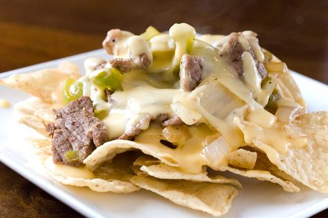 Philly Cheesesteaks and Nachos meet in beautiful, delicious harmony. Cheesesteak Nachos, Nachos Recipes, Tasty Appetizers, Rib Steak, Delicious Appetizers, Cheese Steak, Philly Cheese, Philly Cheesesteak, Nachos Recipe