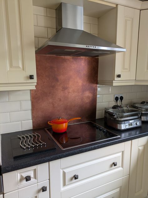 https://flic.kr/p/2qerVzw | Aged Copper Splashback | This stunning 1.2mm thick copper sheet features a beautiful aged patina, making it a striking addition to any kitchen as a splashback. Unlike many cheaper alternatives, our copper sheets maintain excellent rigidity, allowing for easy handling and installation. Each splashback is custom-made to suit your specific dimensions, ensuring a perfect fit for your space. The unique patina on every piece guarantees that no two splashbacks are alike, adding a touch of individuality to your kitchen. Additionally, each splashback is protected with a high-quality clear lacquer finish, enhancing its durability and preserving its stunning appearance. Copper Splashback Kitchen, Copper Backsplash Kitchen, Viking Garden, Copper Splashback, Brushed Nickel Kitchen, Copper Backsplash, Aged Copper, Kitchen Splashback, Copper Sheets