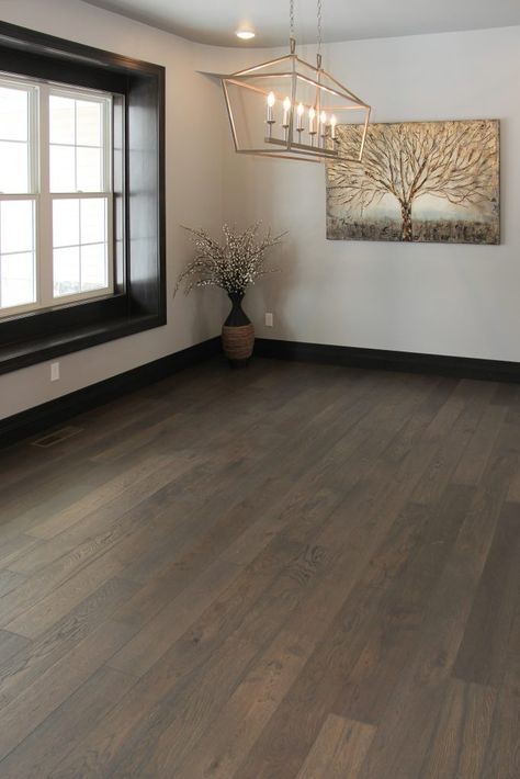 Dark Hardwood Flooring Dark Floor Trim Ideas, Dark Floorboards Aesthetic, Dark Brown Wooden Flooring Bedroom Interior Design, Chocolate Floors Living Rooms, Dark Hybrid Flooring, Dark Maple Floors, Dark Laminate Flooring Living Room, Brown Wood Floor Kitchen, Dark Floor Home Decor