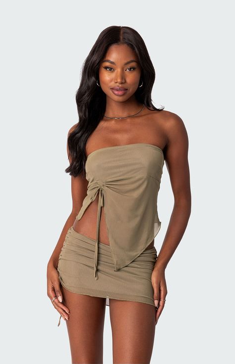 This tube top is made from a sheer mesh fabric and features an asymmetric hem that will have all eyes on you. Throw on a pair of heels and its matching skirt for a show-stopping look, perfect for your next event, or night out.Tube topGathered tie detailAsymmetric hemSheer mesh fabricPolyester, SpandexModel wears size SModel height is 5'9Item care: Wash with similar color Edikted Womens Joy Asymmetric Sheer Mesh Tube Top - Green size XL Asymmetrical Top Outfit, Mesh Tube Top, Tube Top And Skirt, Skirt And Top Set, Night Out Outfit, All Eyes, Going Out Outfits, Festival Outfit, Festival Outfits