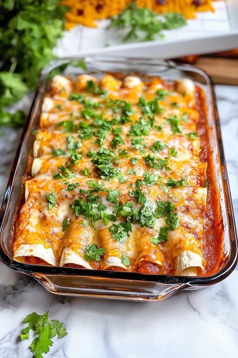 Craving some delicious homemade comfort food? The Best Chicken Enchiladas recipe is here to satisfy! With tender shredded chicken, zesty enchilada sauce, and plenty of cheese, this dish promises all the authentic Mexican flavors. Perfect for family dinners or gatherings, these enchiladas will be your new go-to. Salsa Chicken Enchiladas, Enchiladas Authentic, How To Make Chicken Enchiladas, Corn Enchiladas Chicken, Enchilada Chicken Recipe, Stove Top Enchiladas, Make Ahead Enchiladas, Kid Friendly Enchiladas, Christmas Enchiladas