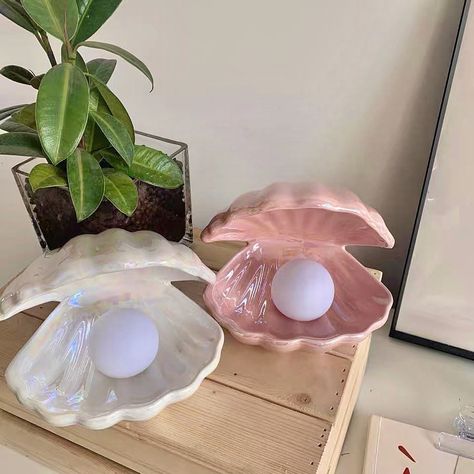 Bring a fresh ocean atmosphere into your room with our gorgeous oyster pearl lamp. With a removable pearl light, why not use the space to store jewellery? A great accessory for boho, coastal, nautical, nordic, minimalist and maximalist themed bedrooms. 🐚 #shelllamp #ledshelllamp Pearl Lamp, Disney Princess Anime, Shell Lamp, Led Night Lamp, Fairy Decor, Nordic Modern, Décor Diy, Ceramic Lamp, Ocean Inspiration